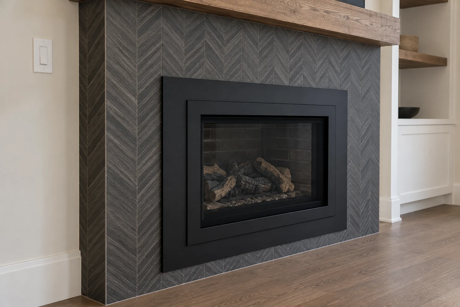 Sealed gas fireplace and wall control in a tiled surround Sealed gas fireplace and wall control in a tiled surround